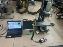Desktop CNC engraving machines are available at hand. The co - Photo taken in person